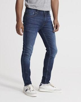 02 travis skinny jeans with whiskers