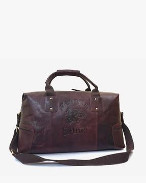 11" vintage voyageur leather duffle bag