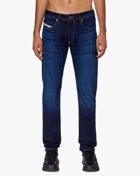 1979 sleenker skinny low-rise mid-wash jeans