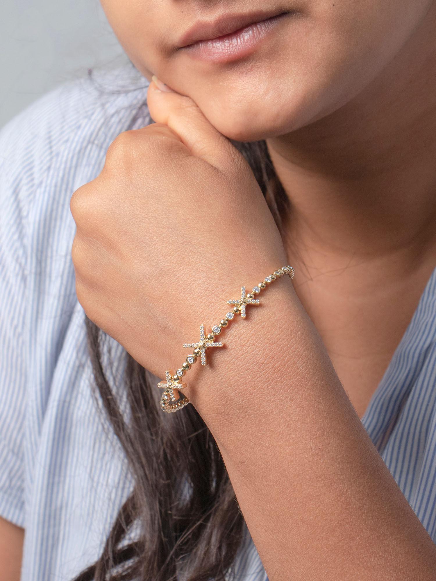 925 sterling silver sparkle knot bracelet in gold - p20b0027