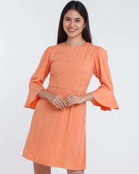 a-line dress with bell sleeves