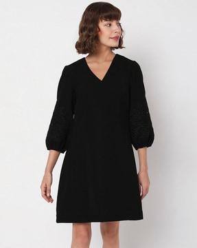 a-line dress with embroidered sleeves