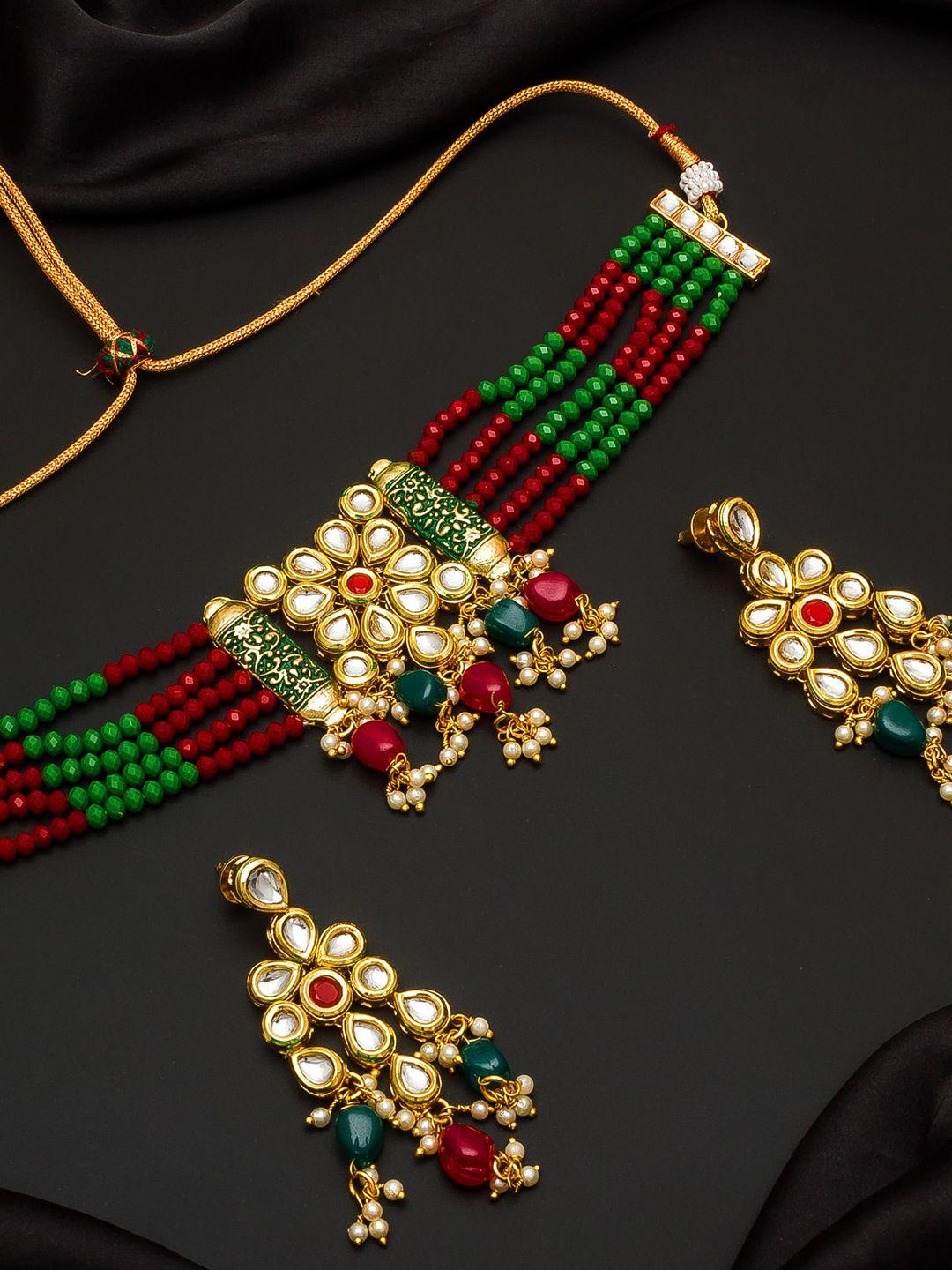 aadita women gold-toned & red kundan studded beaded jewellery set