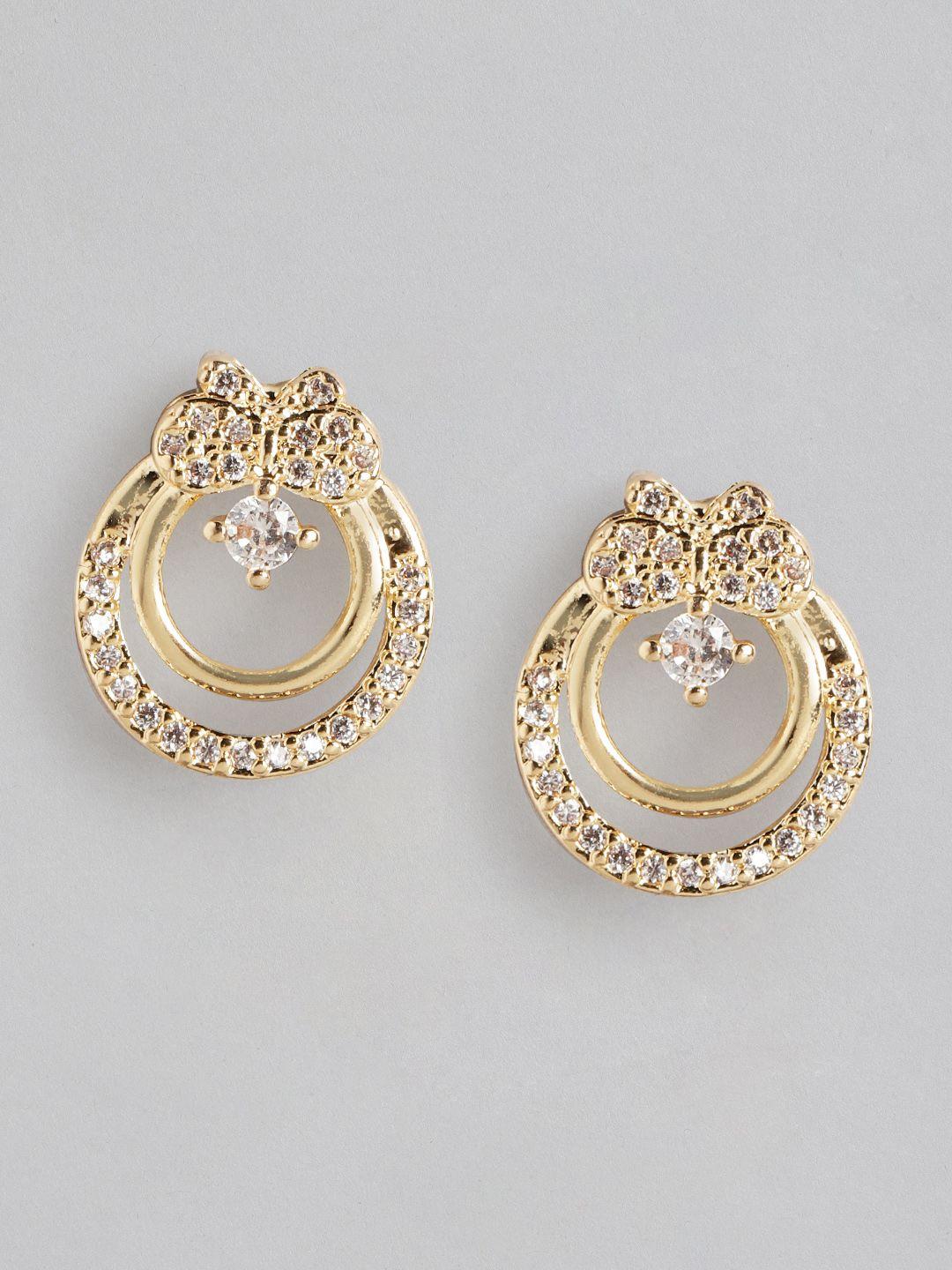 aadvik designs gold-plated ad studded crescent shaped studs earrings