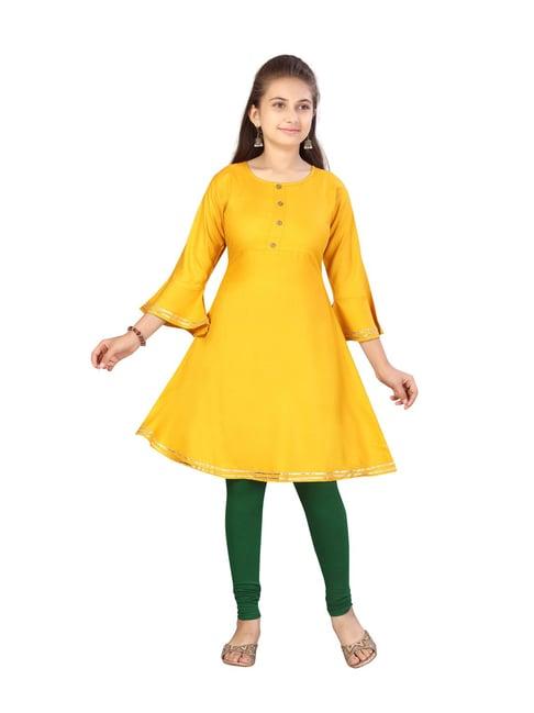 aarika kids yellow solid kurti