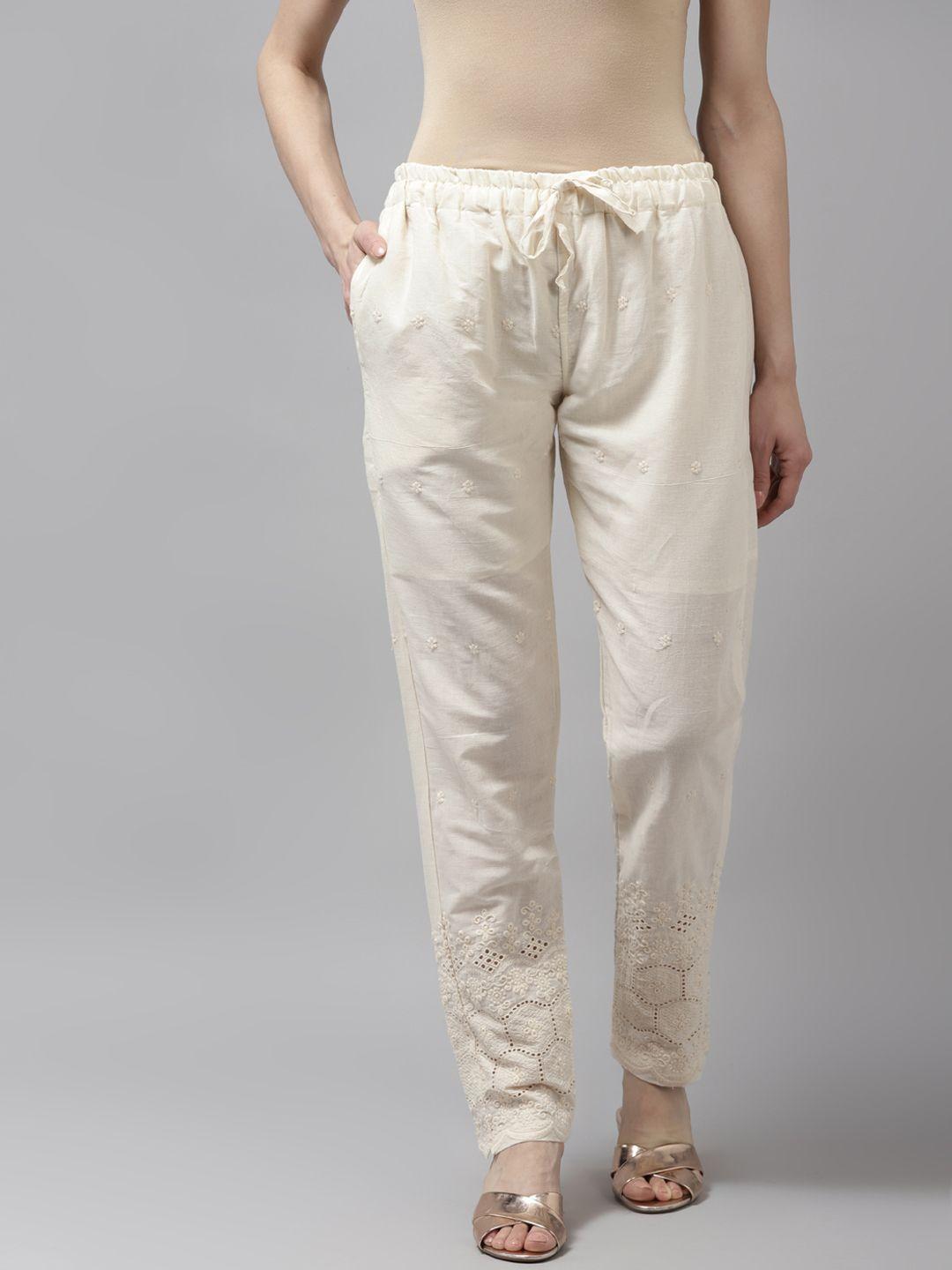aarika women cream-coloured pleated trousers