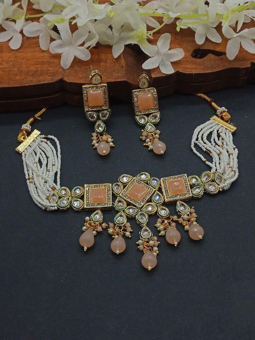 aashish imitation gold-plated american diamond-studded & beaded jewellery set