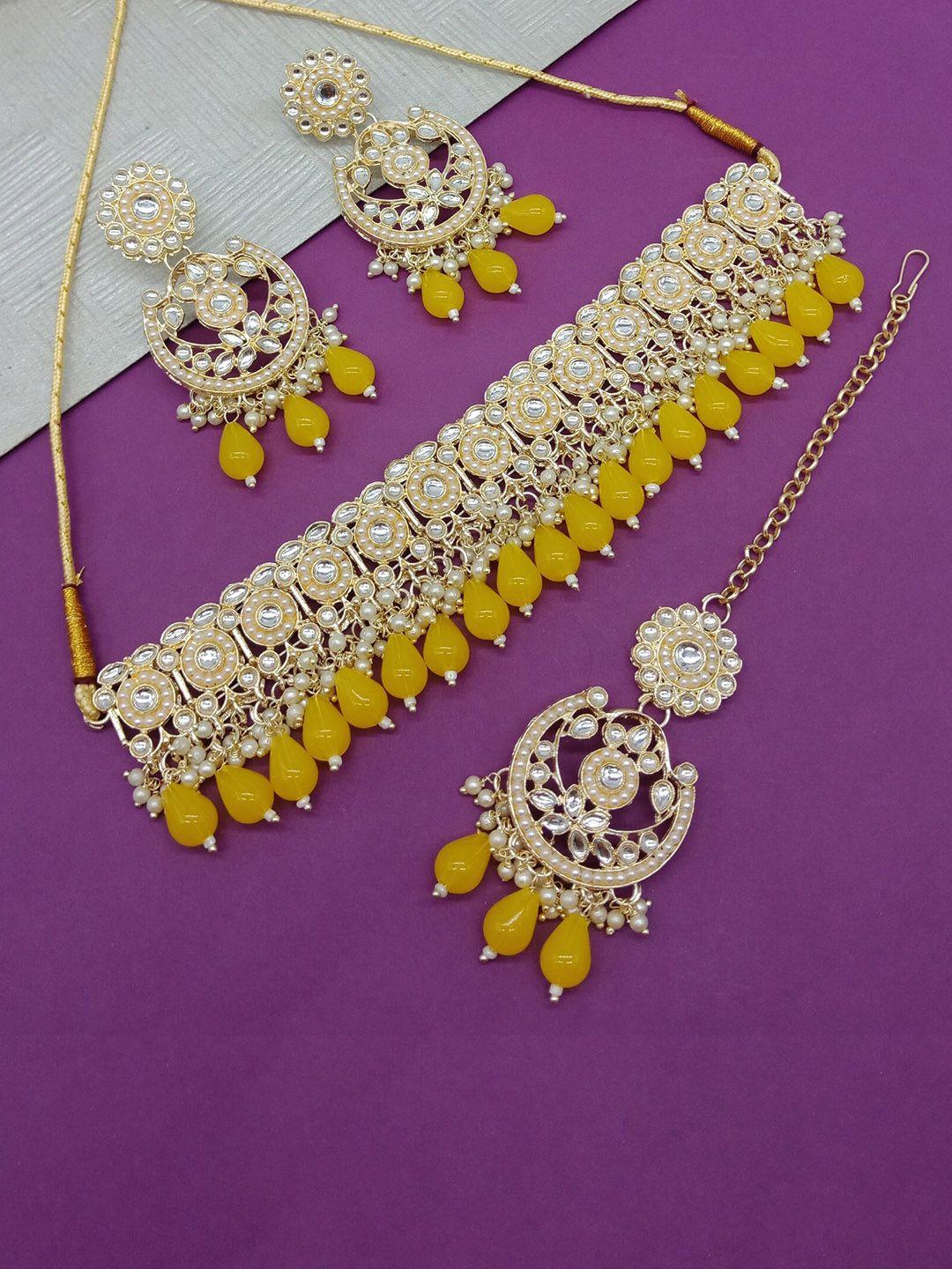 aashish imitation gold plated kundan studded & pearl-beaded jewellery set