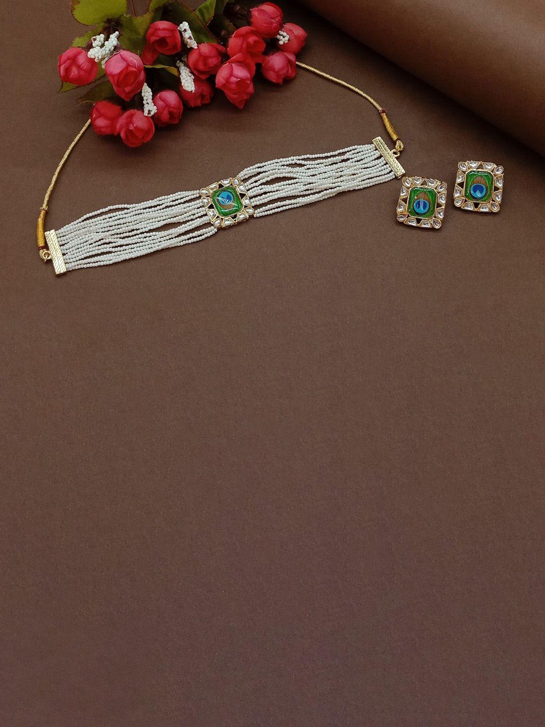 aashish imitation gold-plated kundan studded jewellery set