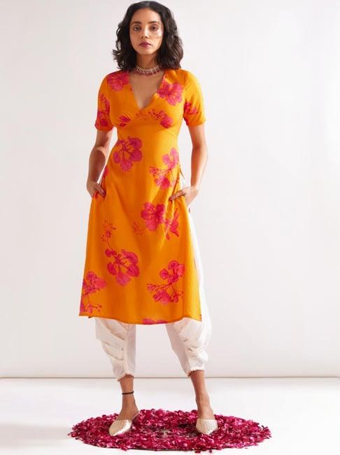 abhishti orange & white floral print kurta dhoti pant set