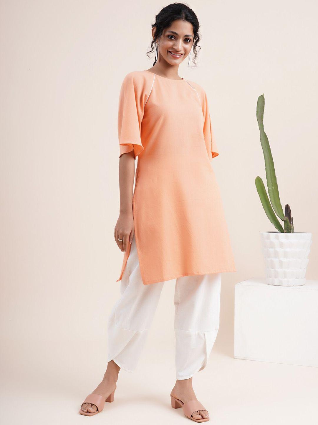 abhishti women peach-coloured empire kurti with dhoti pants