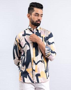 abstract print shirt with curved hemline