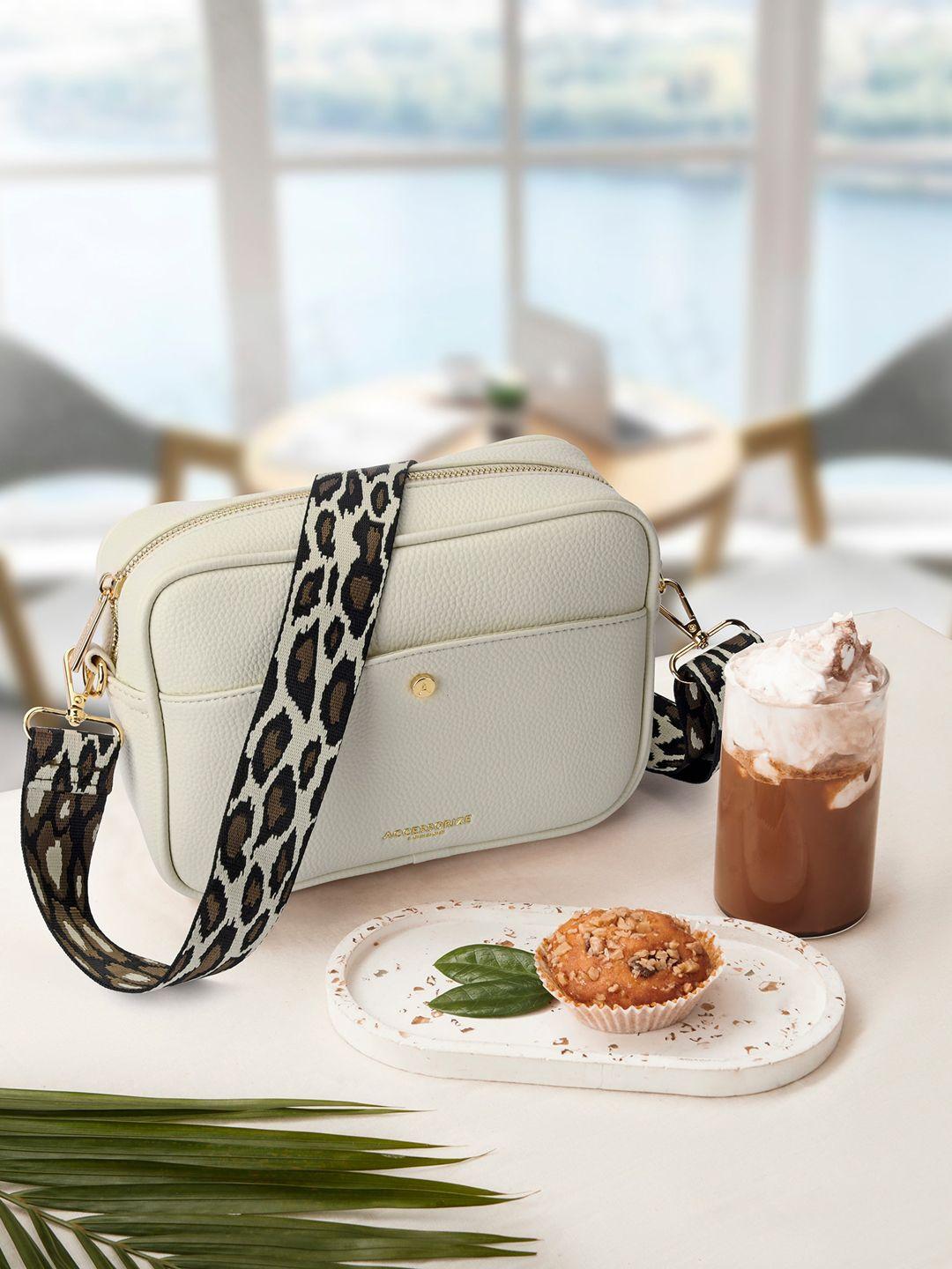 accessorize cream-coloured structured sling bag