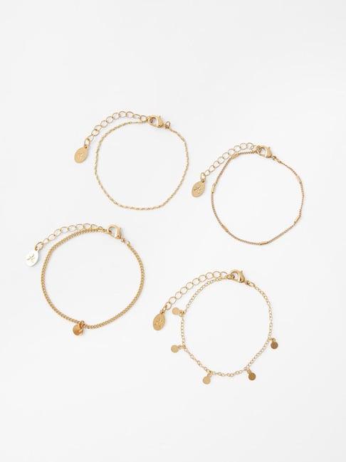 accessorize london golden alloy flexible fit bracelet (set of 4)