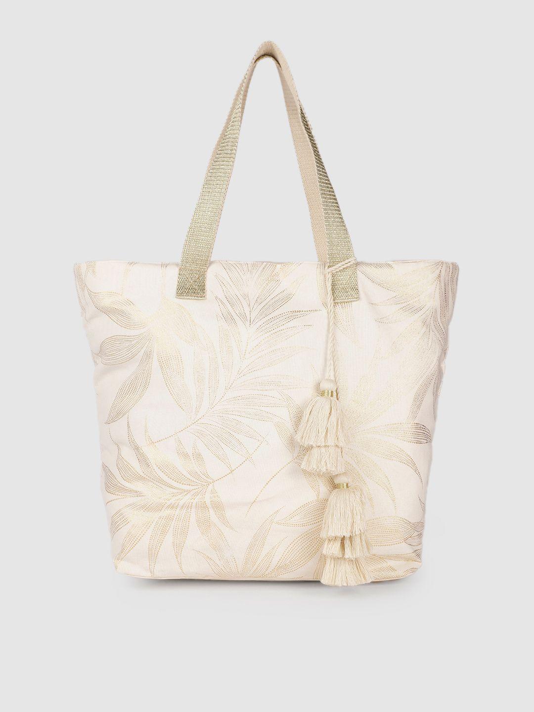 accessorize off-white printed shopper tote bag with tasselled detail