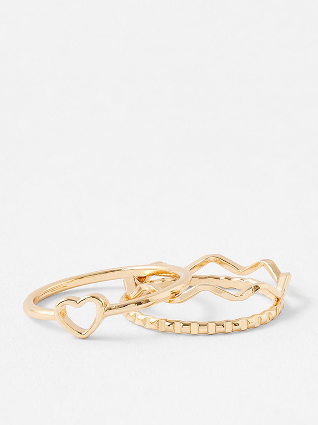 accessorize set of 3 gold-plated heart wave pack finger rings