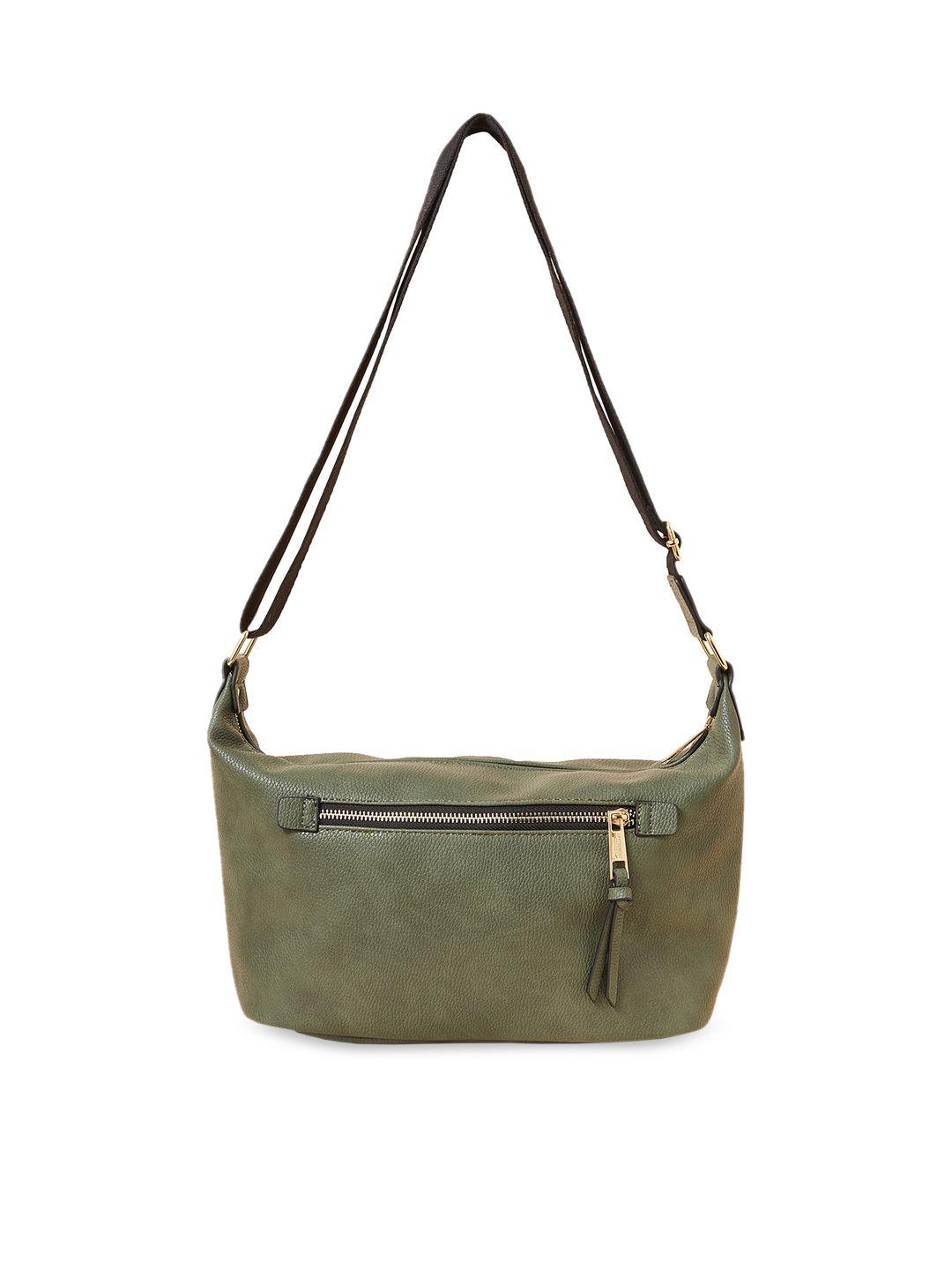 accessorize structured sling bag with tasselled