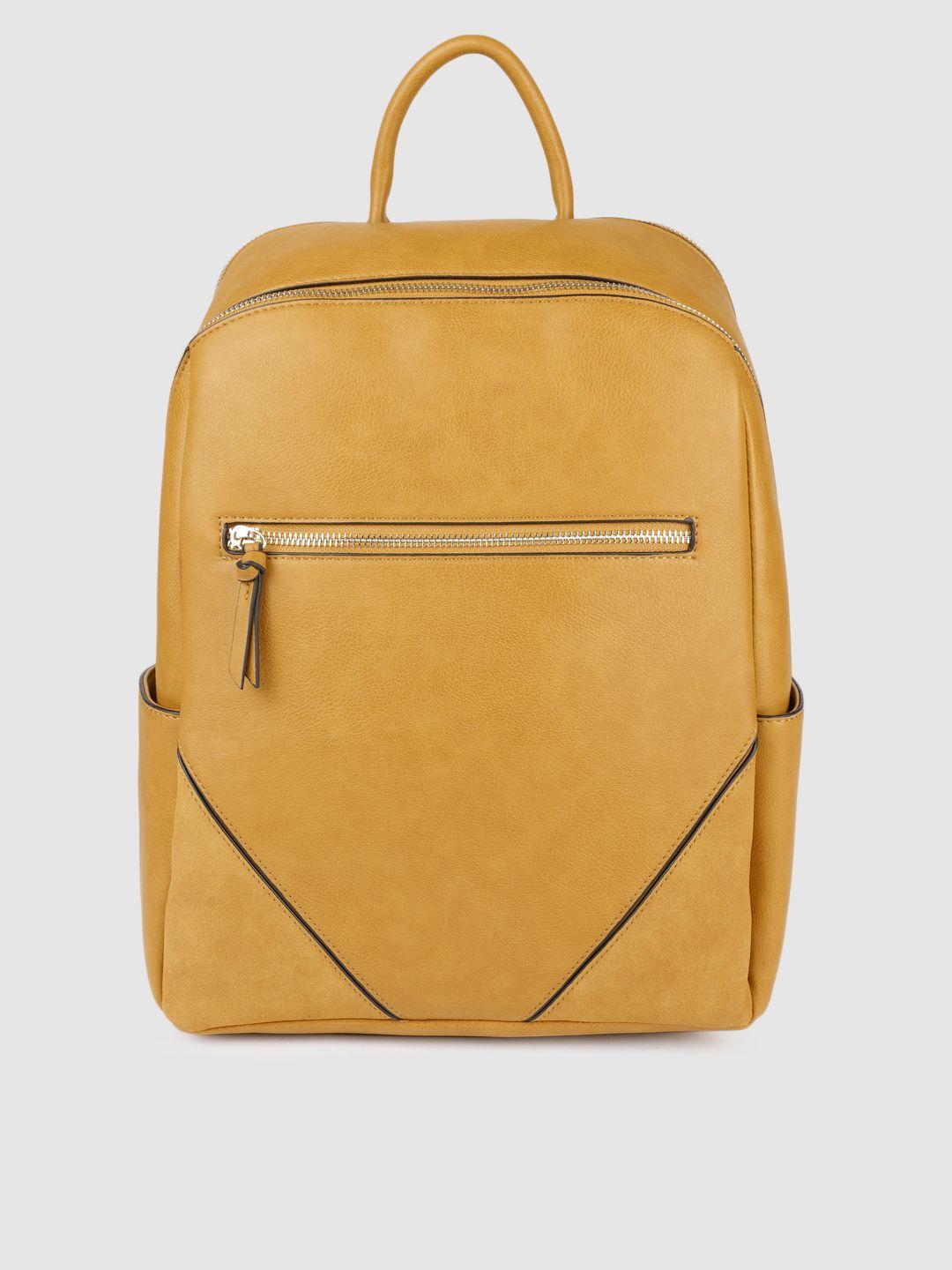 accessorize women yellow judy solid backpack