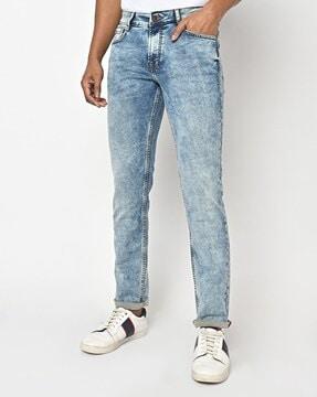 acid-wash slim fit jeans