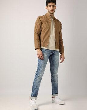 acid-wash slim fit jeans