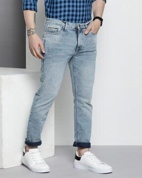 acid-wash slim fit jeans