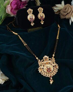 ad studded gold-plated mangalsutra & earrings set