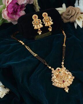 ad studded gold-plated mangalsutra & earrings set