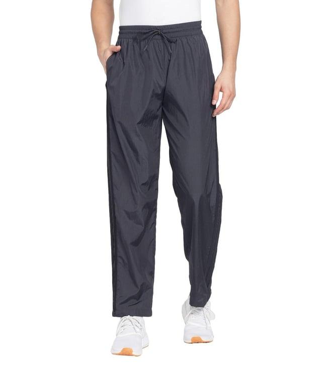 adidas originals black warm up stripes loose fit trackpants