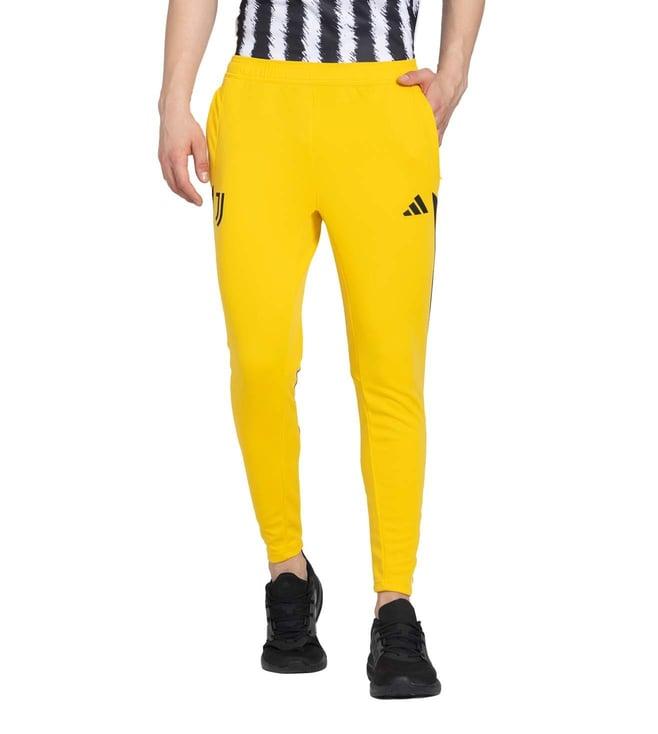 adidas yellow logo slim fit trackpants