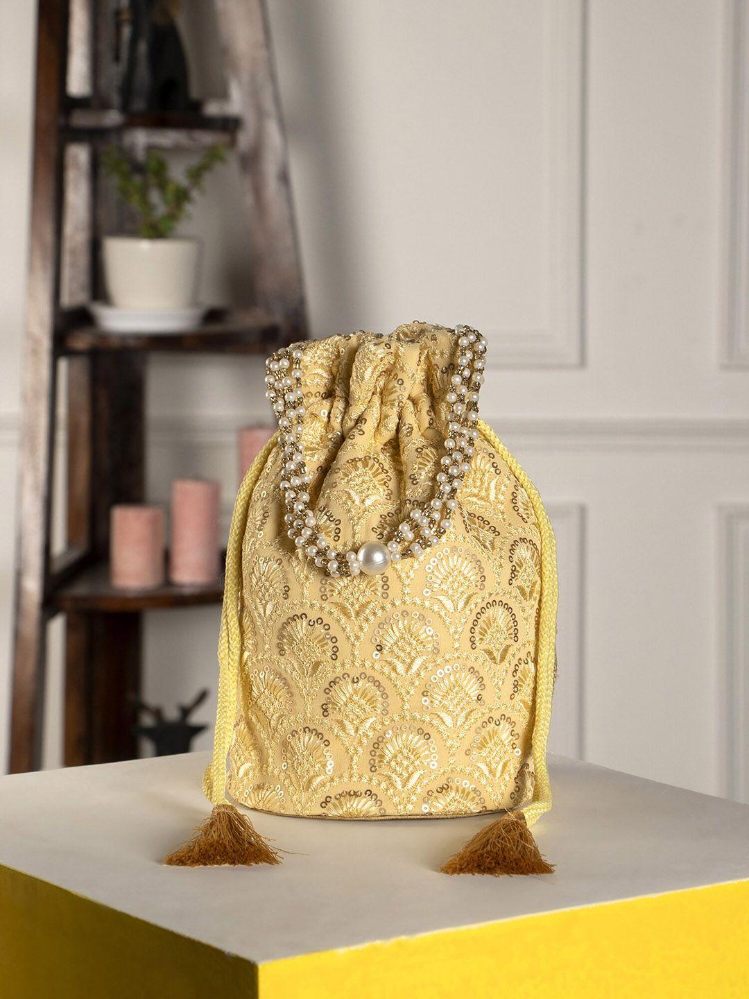 aditi wasan embroidered potli clutch