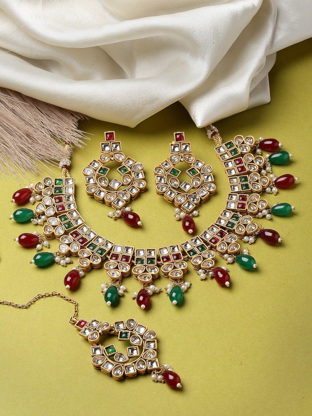 adiva gold-plated kundan stone studded & beaded jewellery set