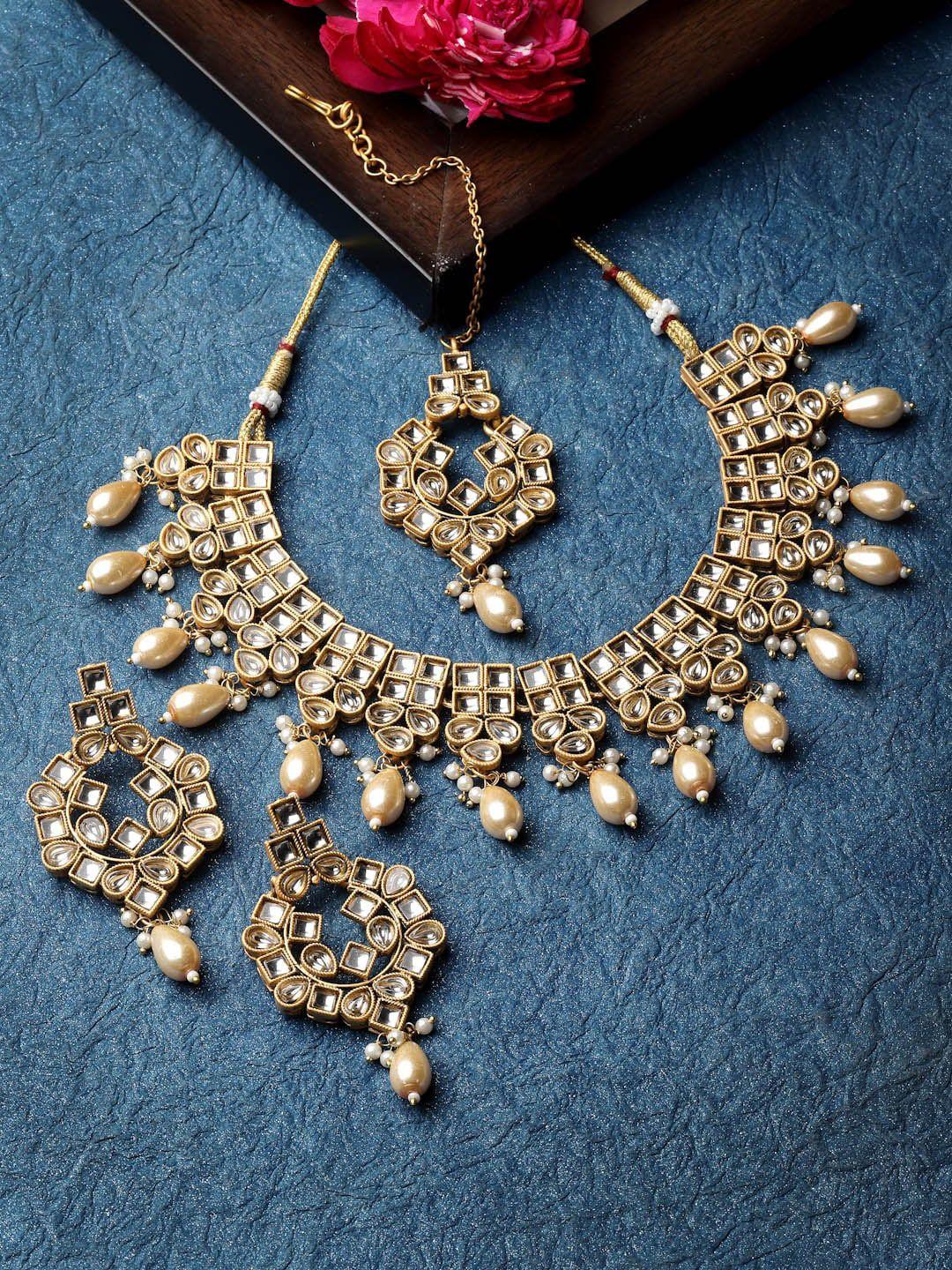 adiva gold-plated kundan studded & beaded jewellery set