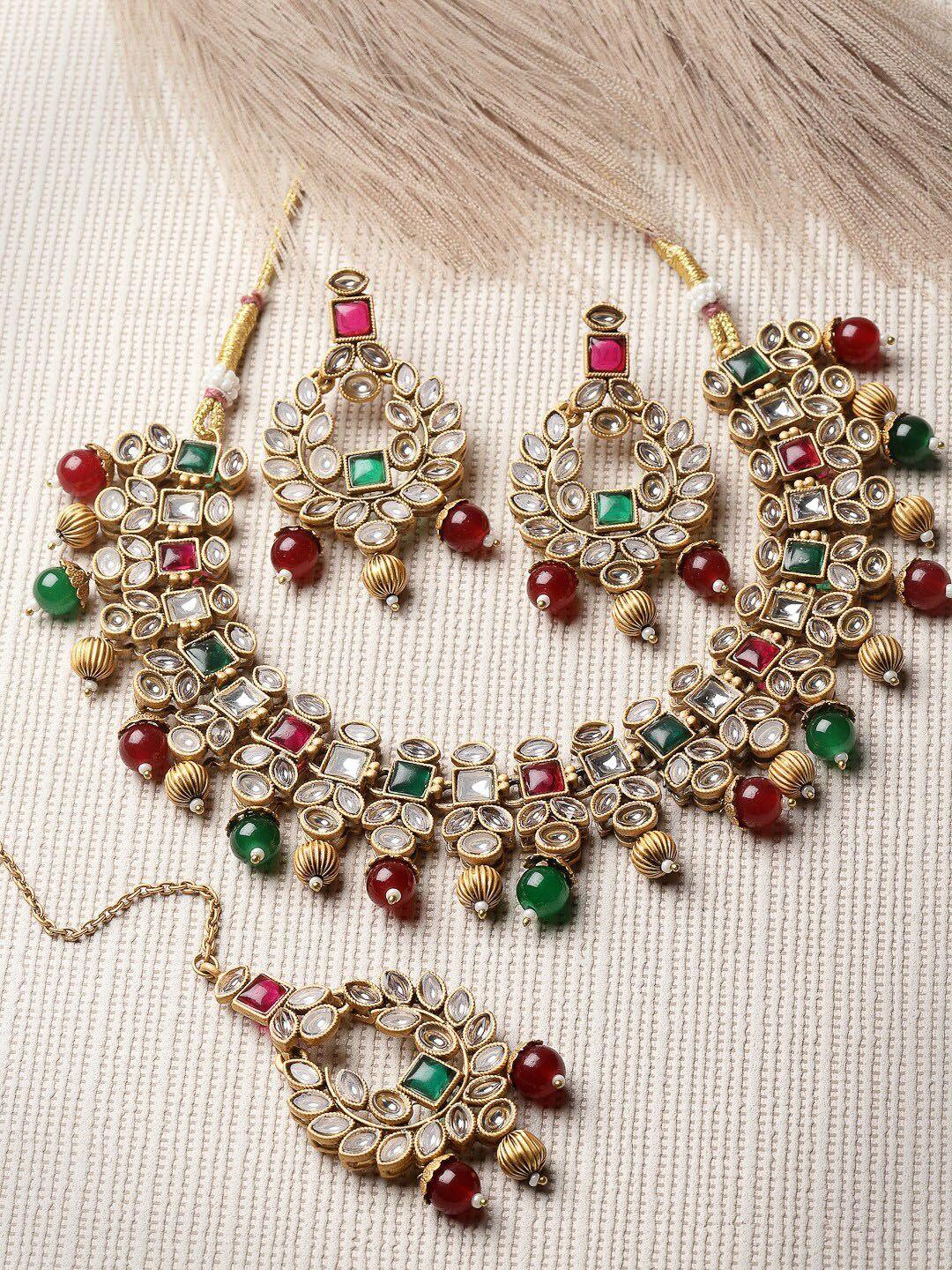 adiva gold-plated kundan-studded & pearl beaded jewellery set