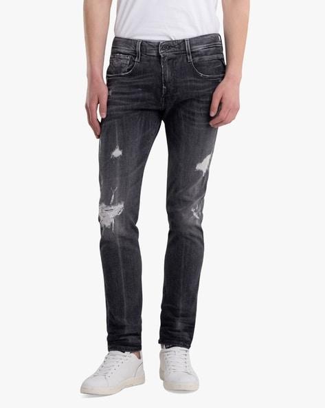 aged distressed mid-wash slim fit jeans