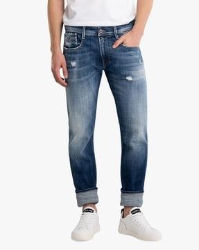 aged power stretch slim fit denim jeans