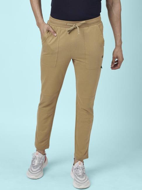 ajile by pantaloons beige cotton slim fit trackpants