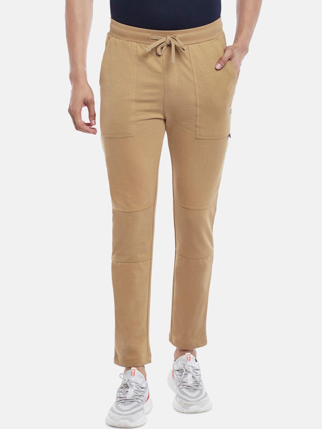 ajile by pantaloons men beige solid cotton slim-fit track pant