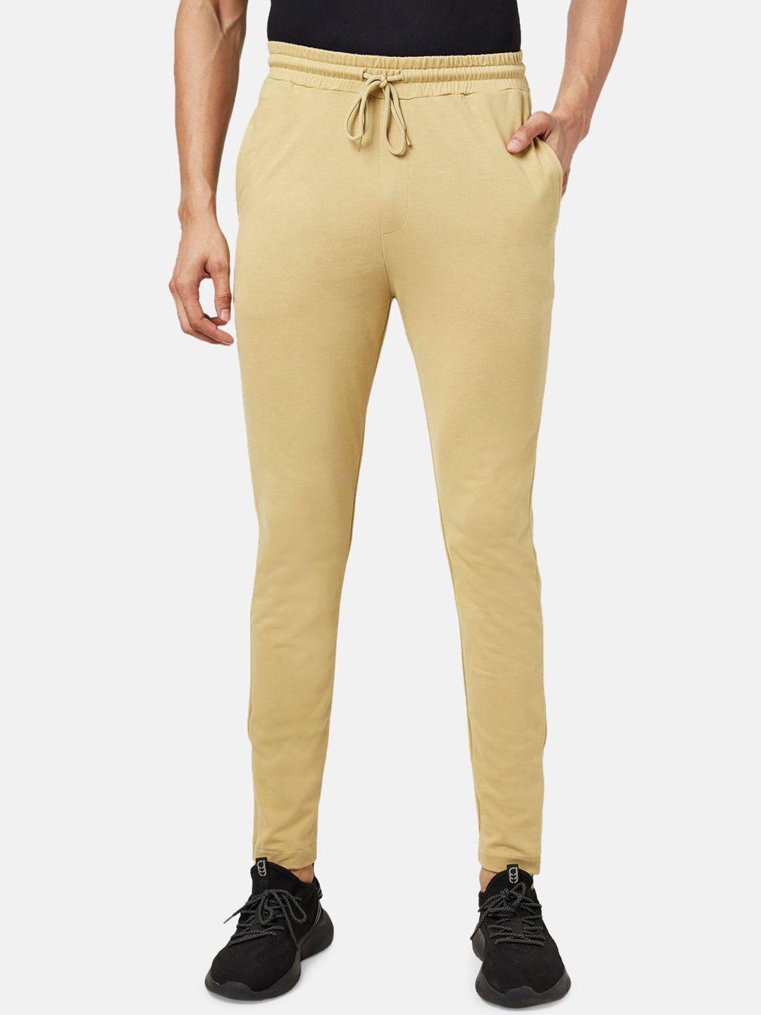 ajile by pantaloons men beige solid cotton track pants