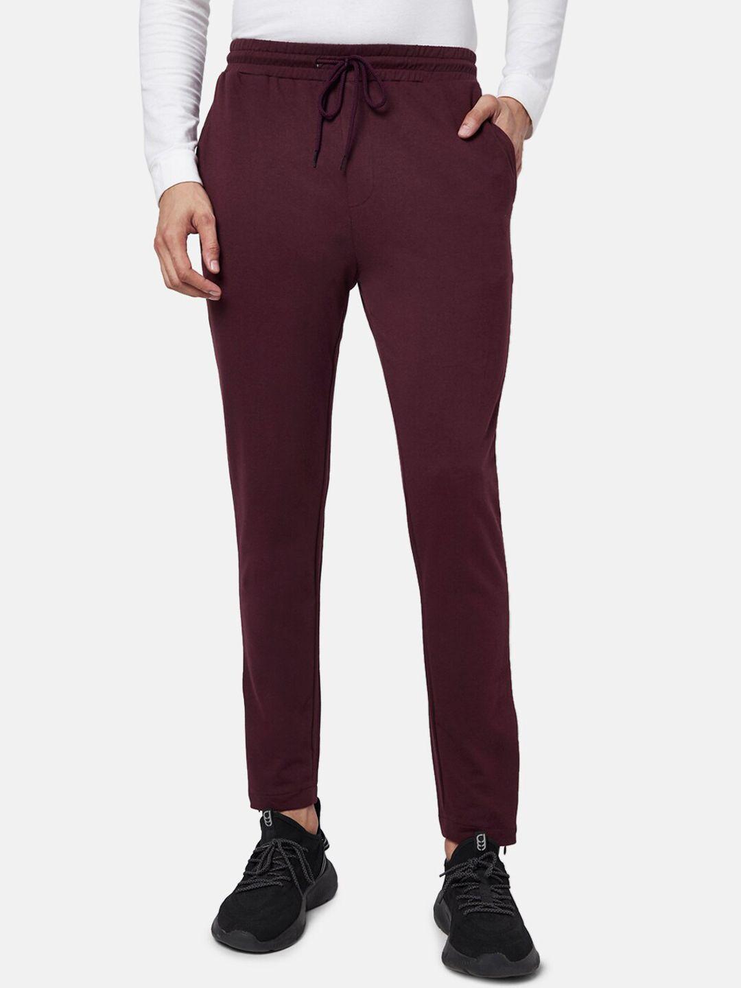 ajile by pantaloons men maroon solid slim-fit track pants