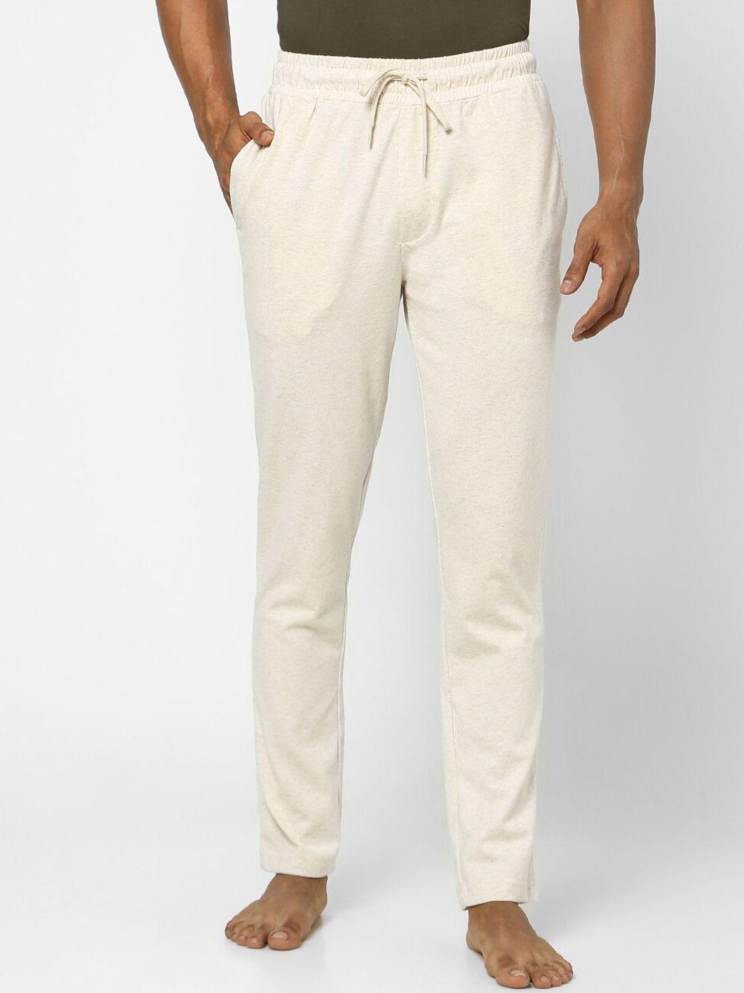 ajile by pantaloons men off white solid cotton track pants