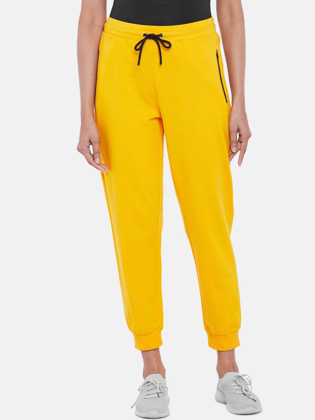 ajile by pantaloons women yellow solid cotton joggers
