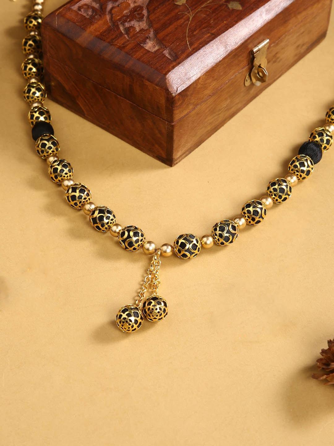 akshara black & gold-toned german silver gold-plated handcrafted necklace