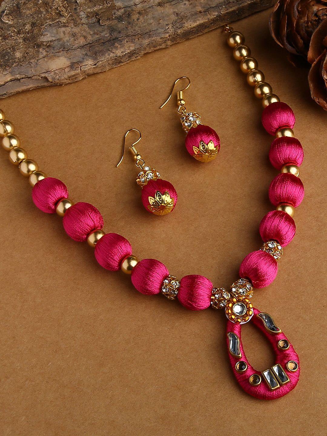 akshara women pink stone-studded balls silk thread jewelry set