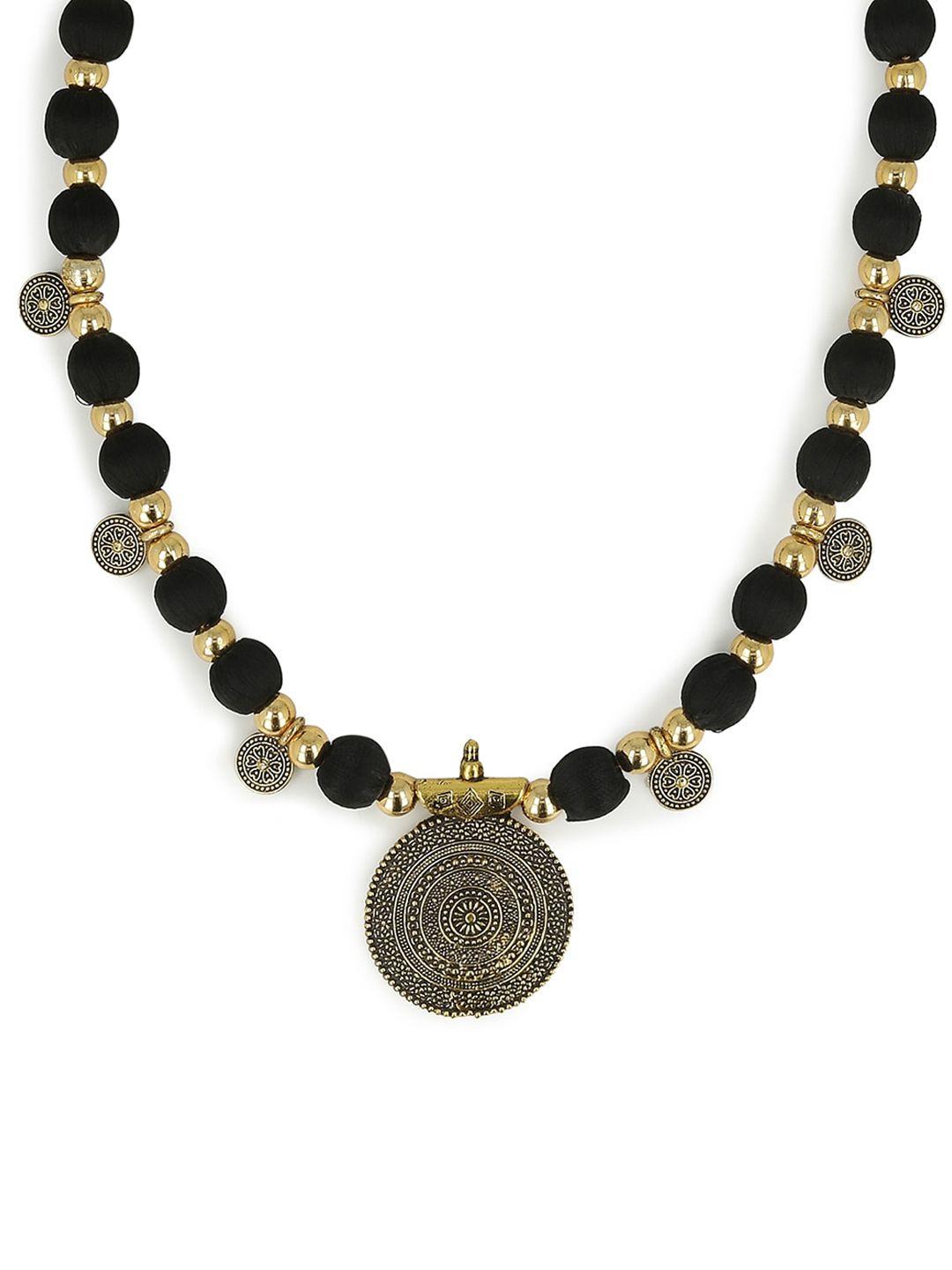 akshara black handcrafted long brass pendant necklace