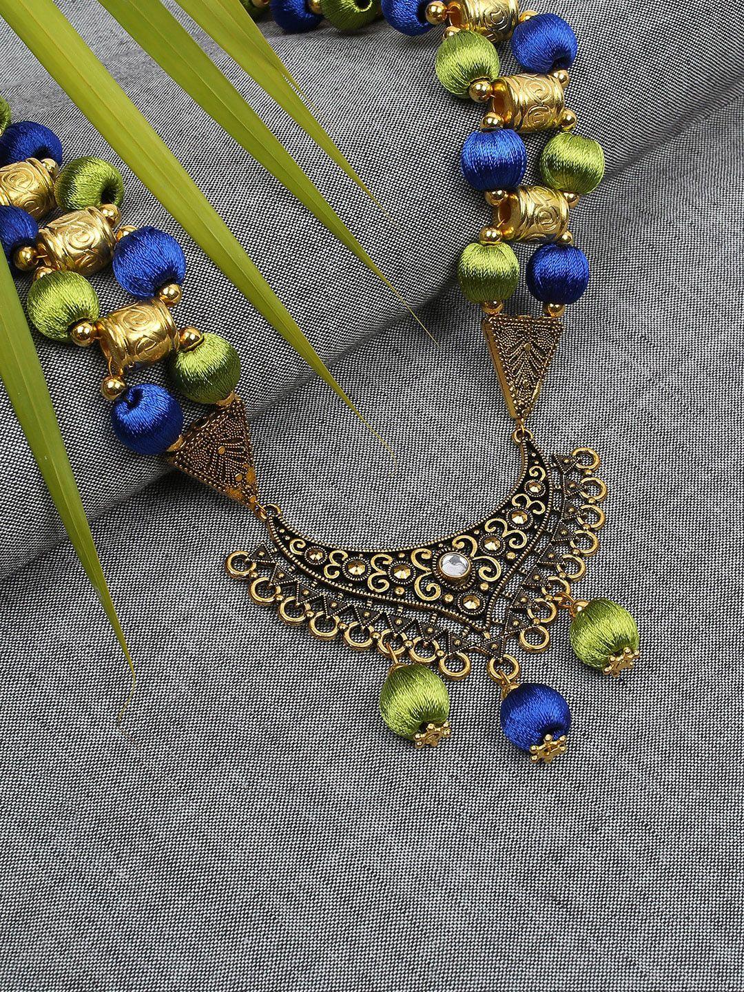 akshara blue & green handcrafted long brass pendent necklace