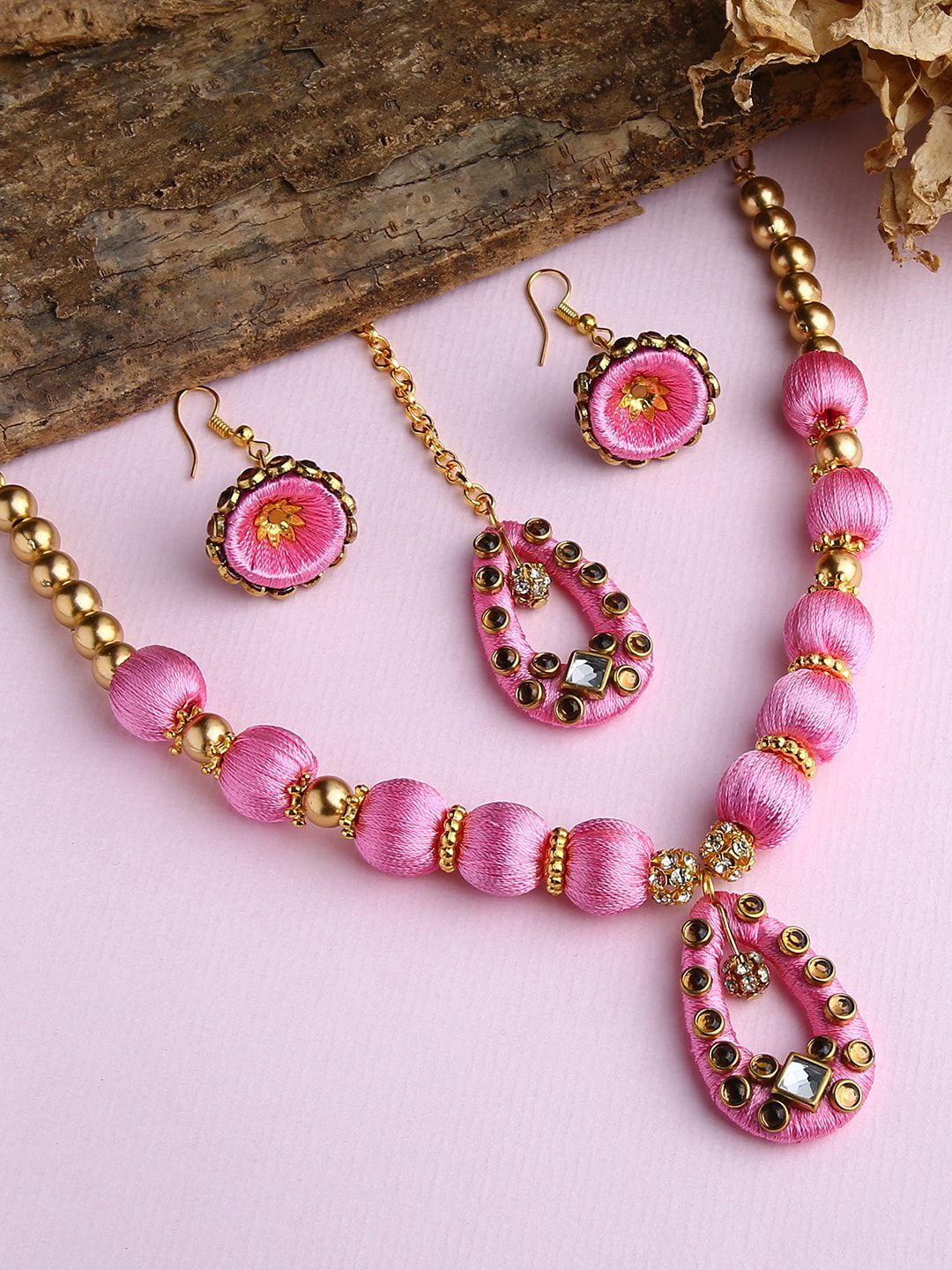 akshara gold-plated & rose-pink stone-studded & beaded wooden balls silk thread jewellery set