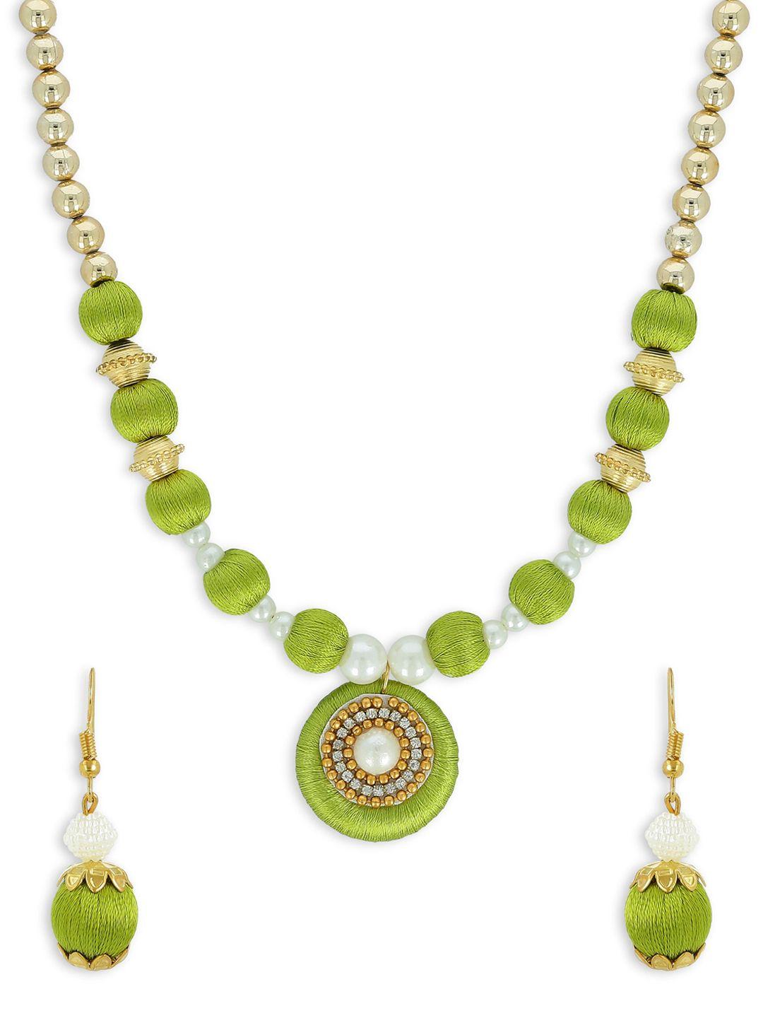 akshara gold-plated green handcrafted jewellery set
