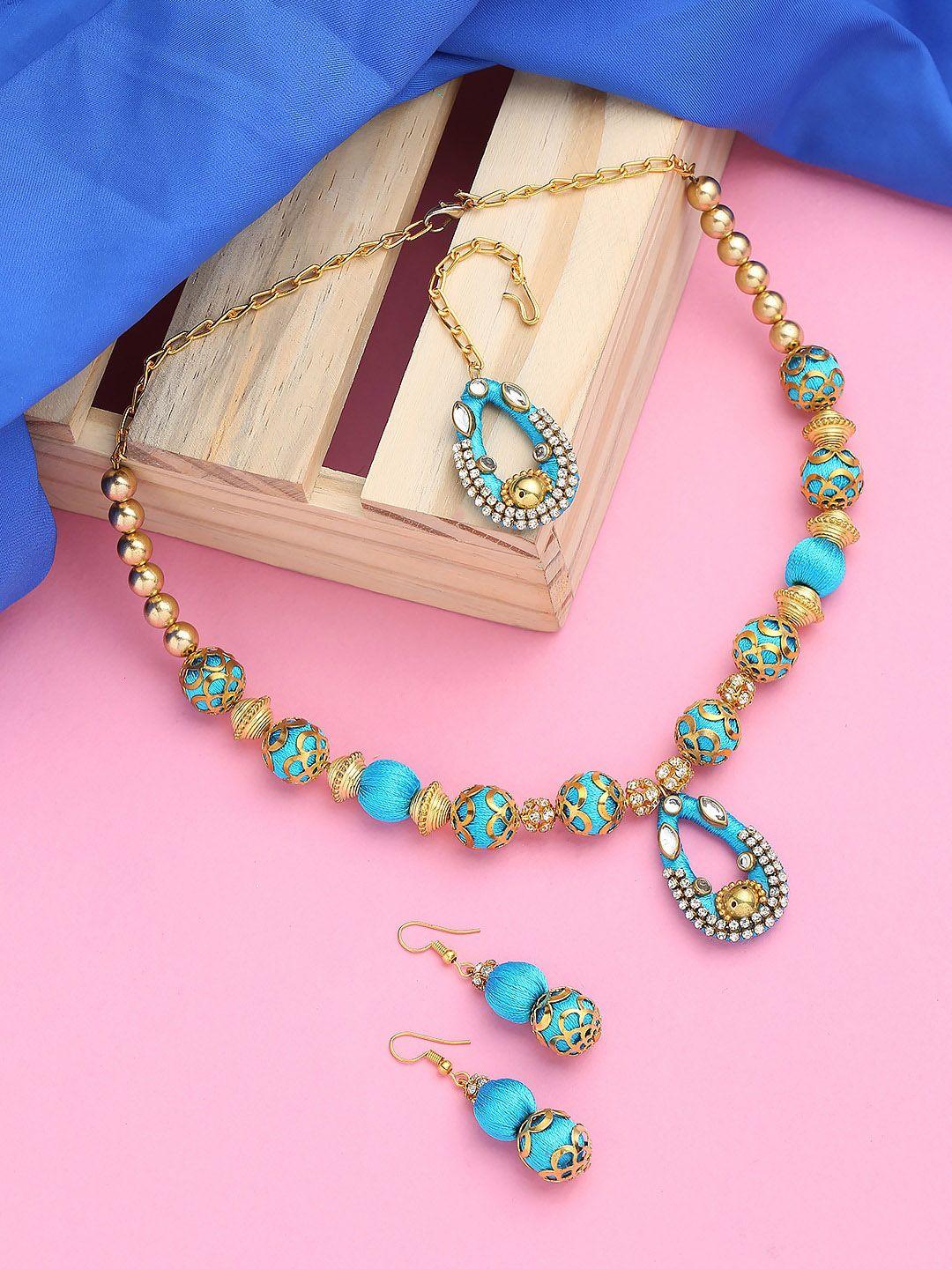 akshara gold-plated stone-studded & beaded jewellery set