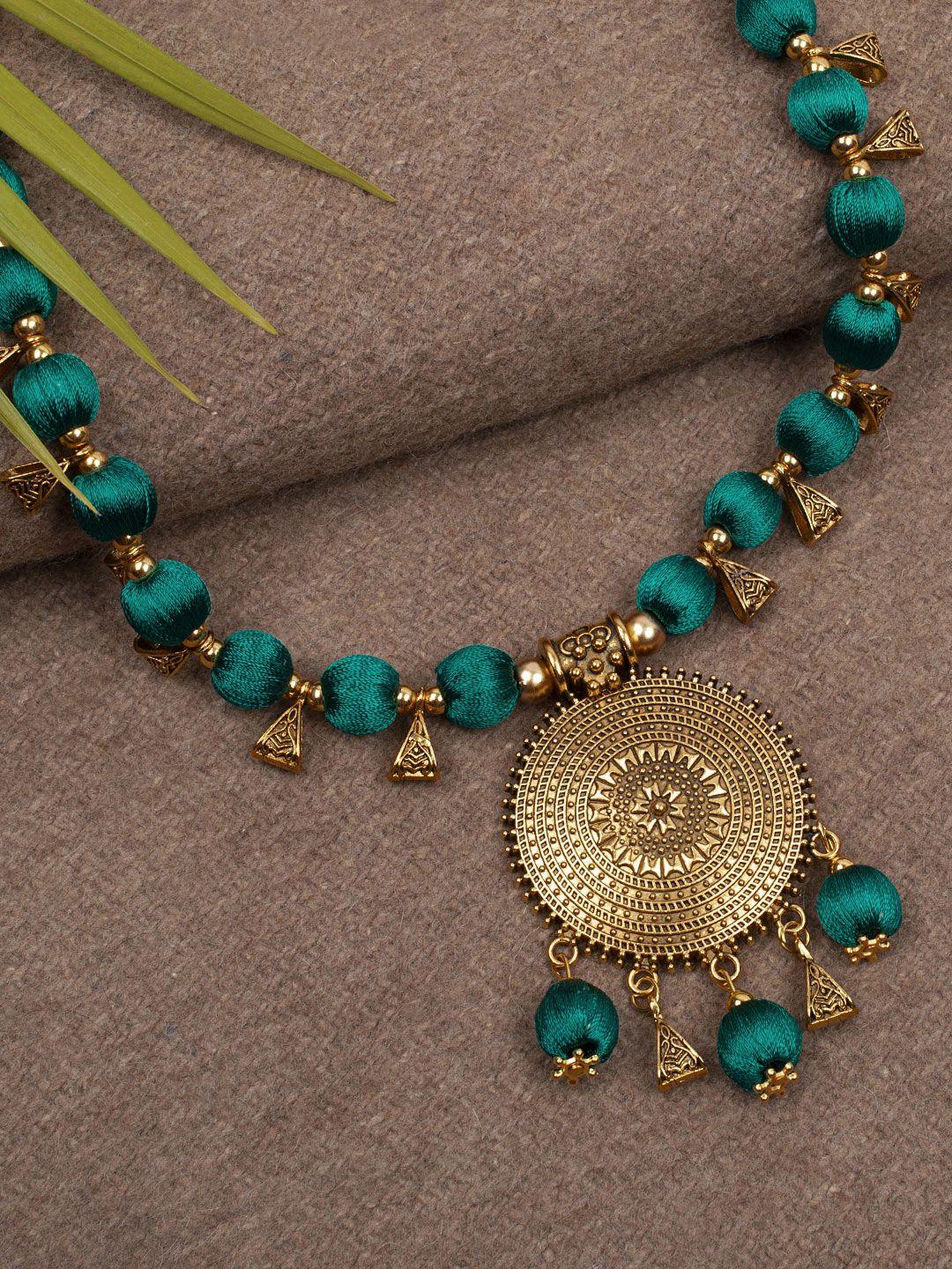 akshara gold-toned & green handcrafted brass necklace