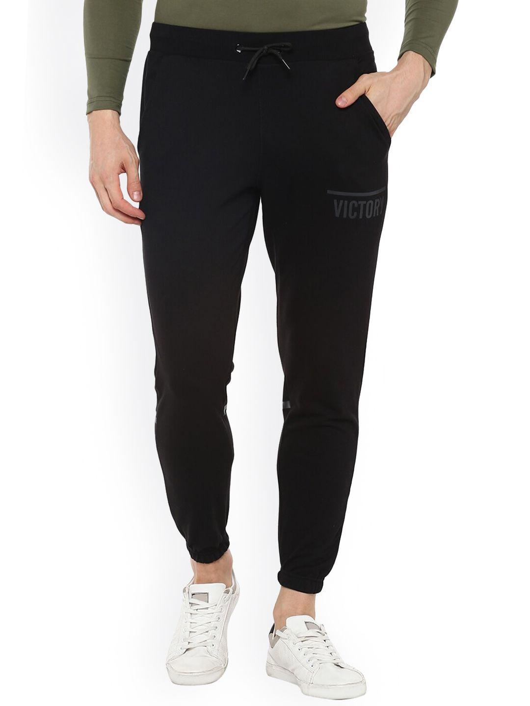 alan jones men black solid slim-fit joggers